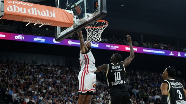 Euroleague: &Omicron; &Omicron;&lambda;&upsilon;&mu;&pi;&iota;&alpha;&kappa;ό&sigmaf; &pi;έ&rho;&alpha;&sigma;&epsilon; &alpha;&pi;ό &tau;&eta; &Lambda;&upsilon;ώ&nu; &kappa;&alpha;&iota; έ&pi;&iota;&alpha;&sigma;&epsilon; &kappa;&omicron;&rho;&upsilon;&phi;ή, ή&tau;&tau;&alpha; &gamma;&iota;&alpha; &Rho;&epsilon;ά&lambda;, &delta;&iota;&pi;&lambda;ό &eta; &Beta;&alpha;&lambda;έ&nu;&theta;&iota;&alpha;, &delta;&epsilon;ί&tau;&epsilon; &beta;ί&nu;&tau;&epsilon;&omicron;
